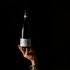 bottiglia in mano di Montepulciano D'Abruzzo DOC della Tenuta Trium di Notaresco a Teramo in Abruzzo